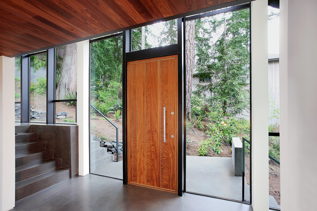 incredible-solid-wooden-entry-door-with-black-frames-mounted-on-glass-wall-also-stylish-handle-featuring-oak-ceiling-ideas-entry