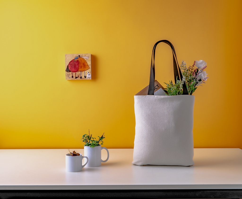 two-white-ceramic-mugs-and-a-white-bag-on-wooden-table-3551355.jpg